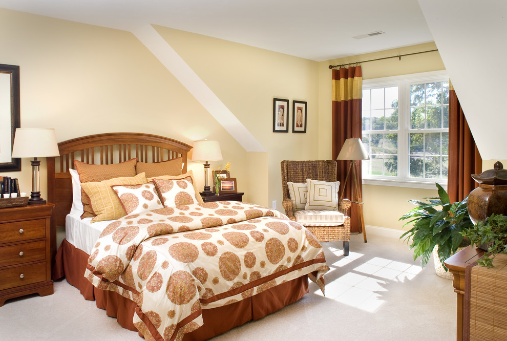 Inspiration for a traditional bedroom in Boston with beige walls and carpet.