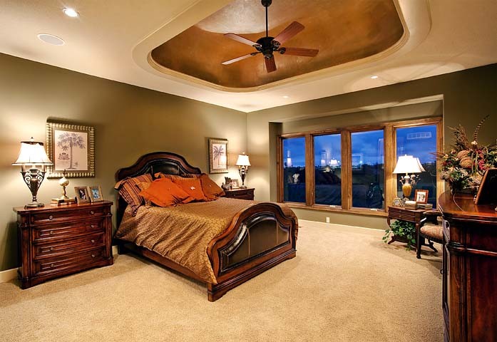 Example of a tuscan bedroom design in Kansas City