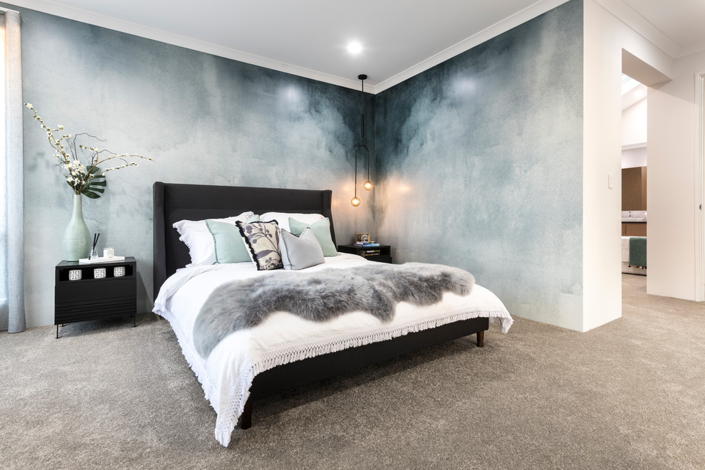 Immagine di una camera matrimoniale design di medie dimensioni con pareti blu, moquette e pavimento beige