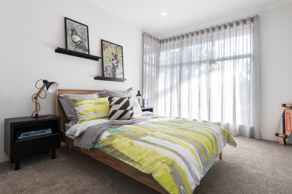 Example of a mid-sized trendy guest carpeted and beige floor bedroom design in Perth with white walls