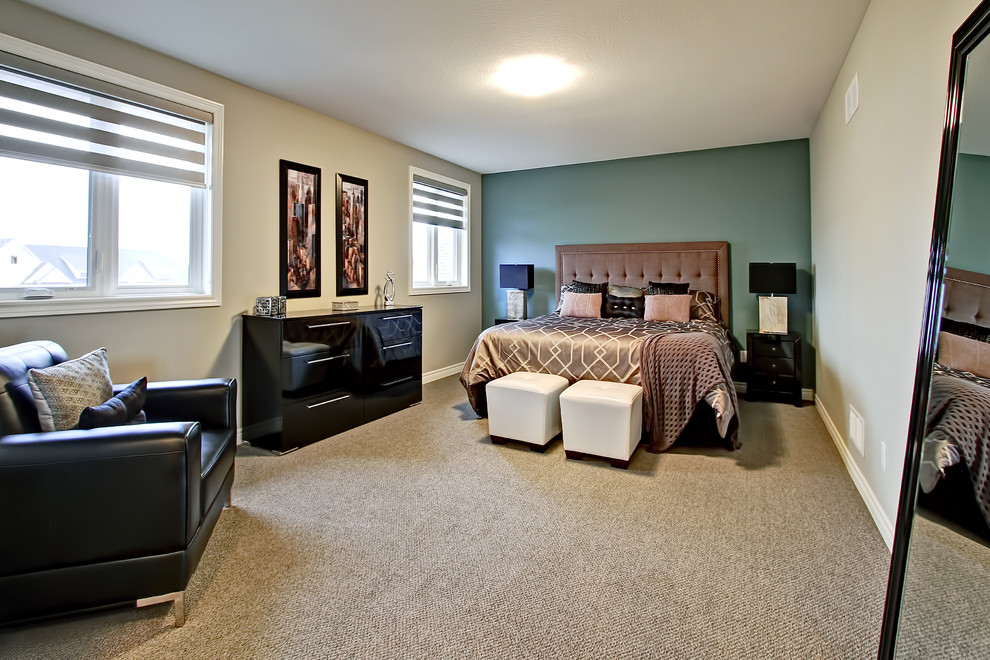 Photo of a medium sized traditional master bedroom in Toronto with grey walls, carpet and no fireplace.
