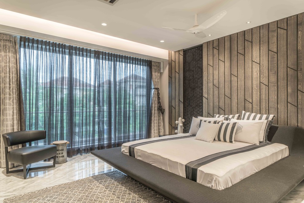 This is an example of a contemporary bedroom in Hyderabad.