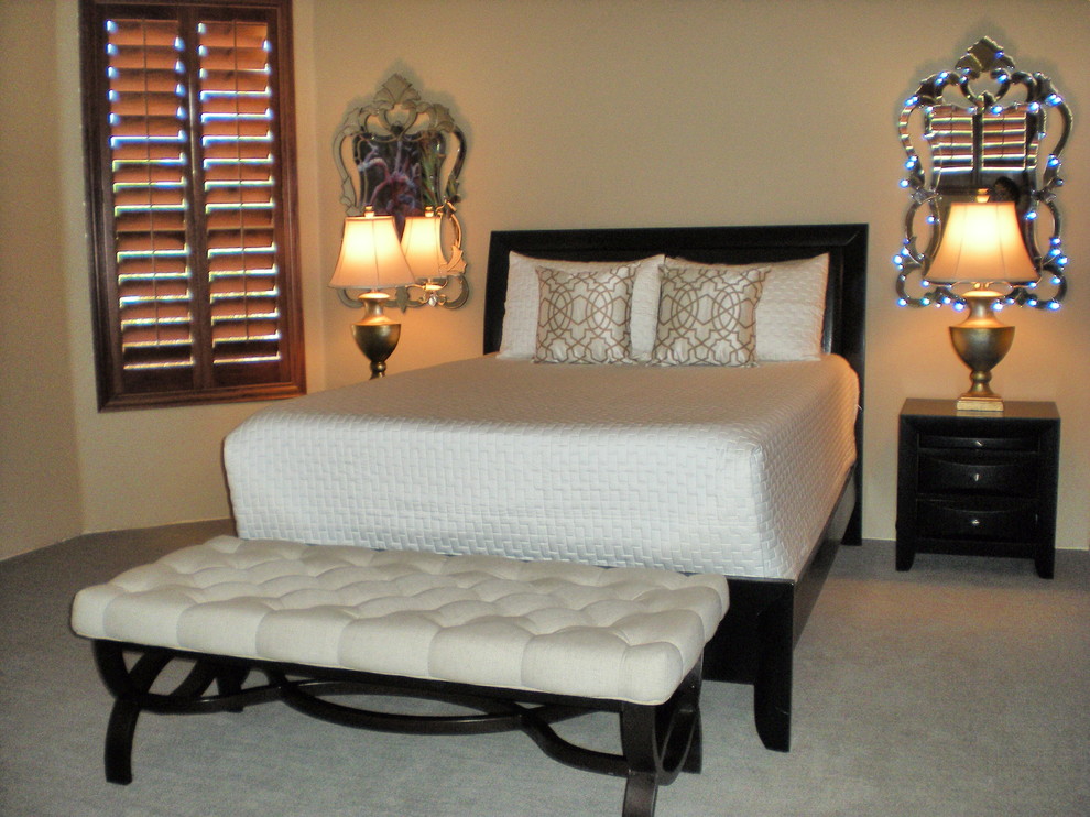 Example of a mid-sized classic master carpeted bedroom design in Phoenix with beige walls and no fireplace