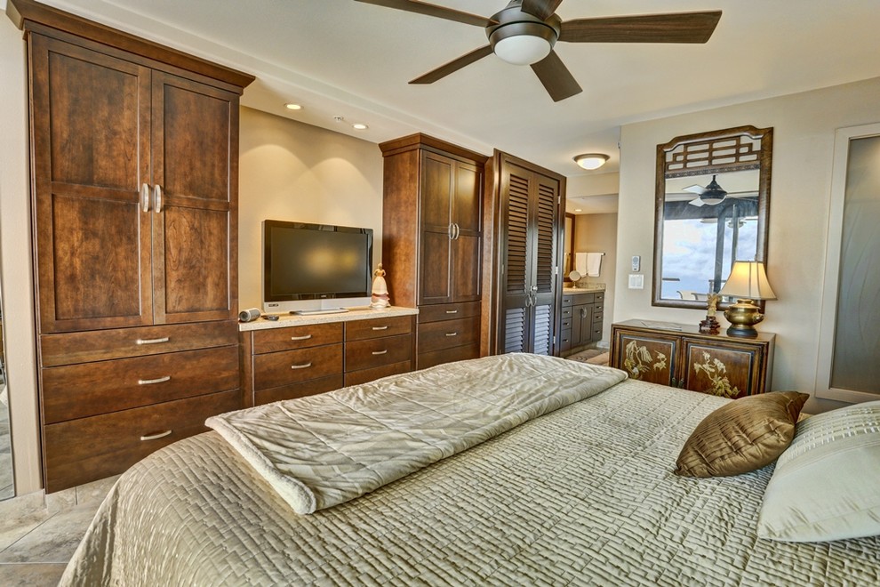 Design ideas for a large traditional master bedroom in Hawaii with beige walls, ceramic flooring, no fireplace and grey floors.