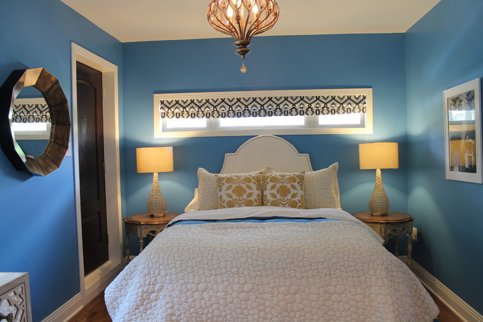 Design ideas for a small classic guest bedroom in Montreal with blue walls, dark hardwood flooring and no fireplace.