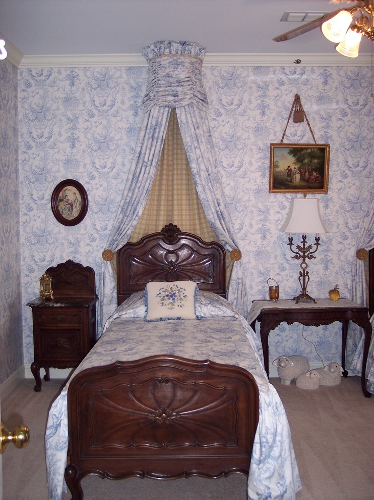 Medium sized traditional guest bedroom in Jackson with blue walls and carpet.
