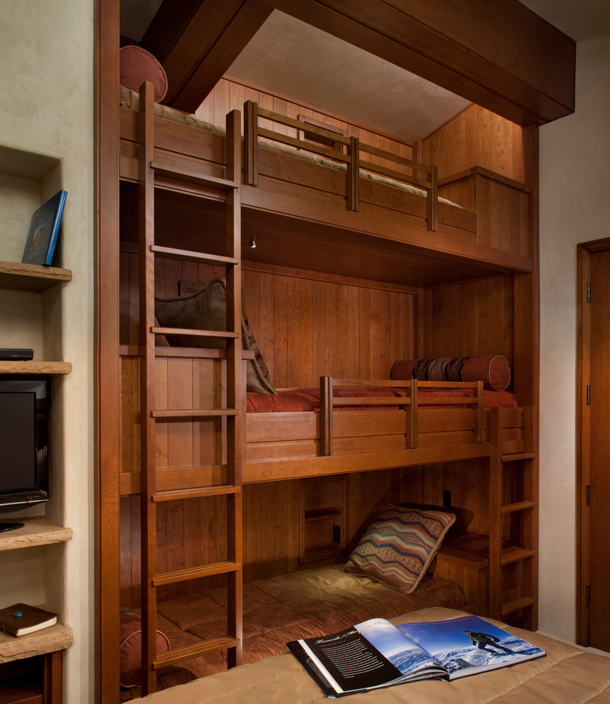 Example of a mid-sized trendy guest carpeted bedroom design in Denver with beige walls and no fireplace