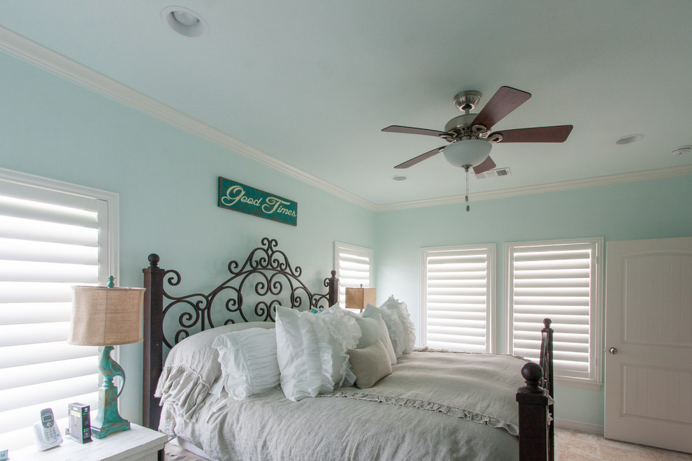 Design ideas for a coastal bedroom in Houston.