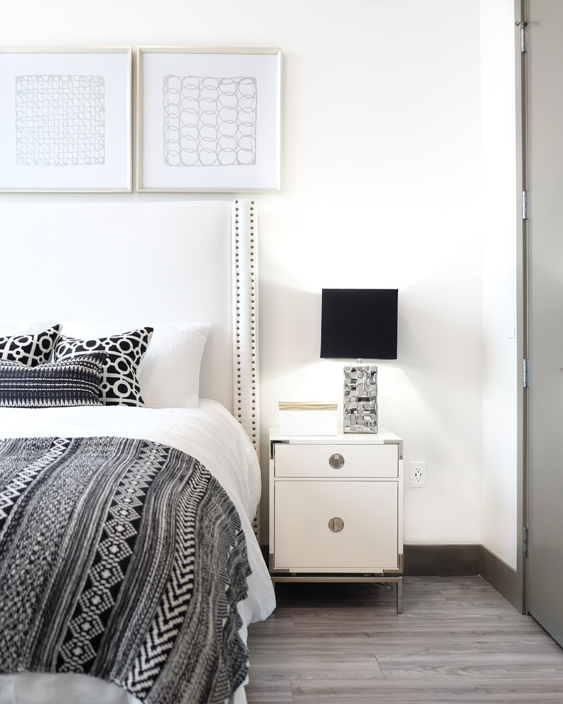Inspiration for a modern vinyl floor and gray floor bedroom remodel in Seattle