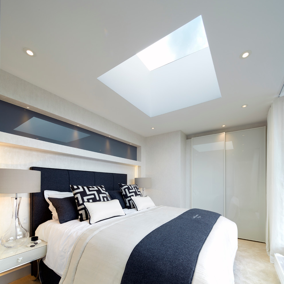 Photo of a contemporary guest bedroom in London.