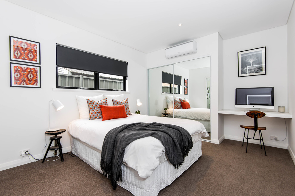 Photo of a contemporary bedroom in Perth with white walls and carpet.