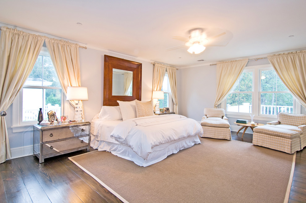 Photo of a classic master bedroom in New York with grey walls, dark hardwood flooring and no fireplace.