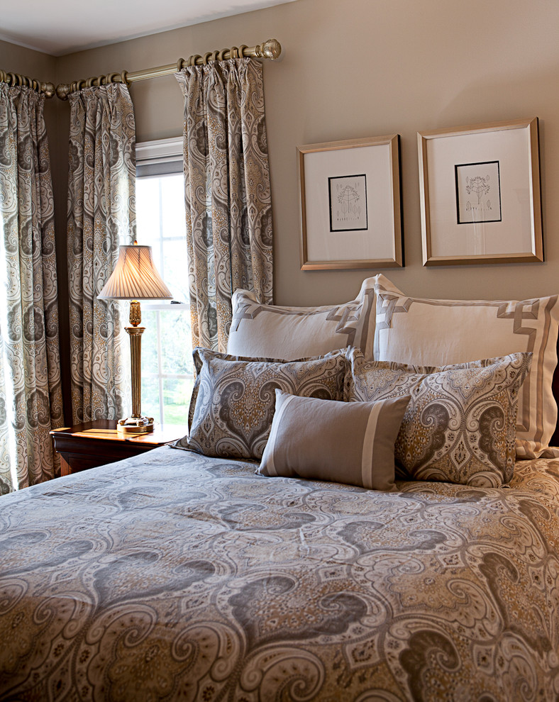 Example of a classic bedroom design in DC Metro with beige walls
