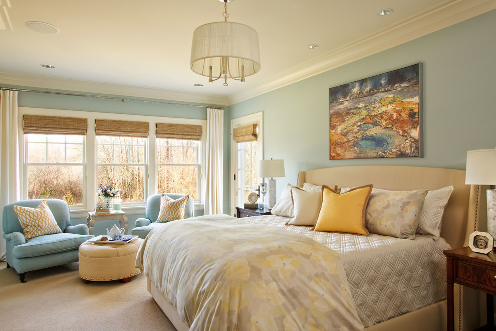 Elegant bedroom photo in Portland with blue walls