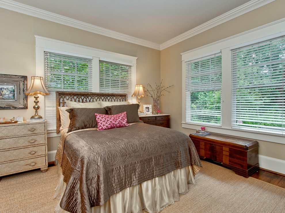 Traditional bedroom in Charlotte with beige walls.