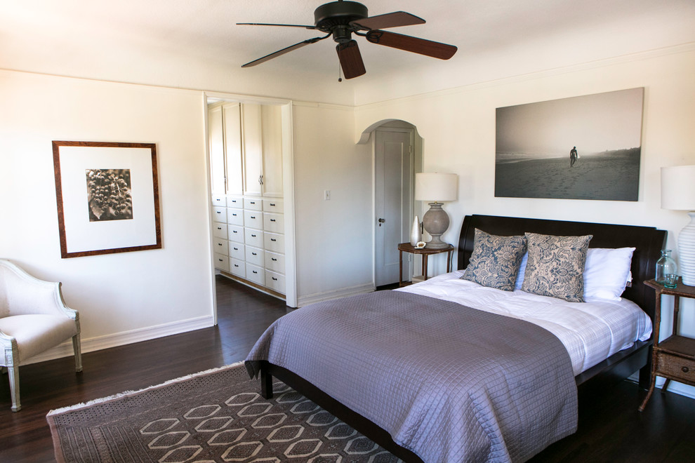 Design ideas for a traditional bedroom in Los Angeles with white walls and dark hardwood flooring.