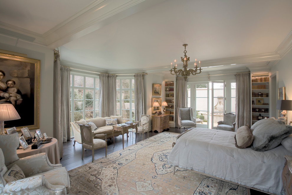 Traditional grey and cream bedroom in Charlotte with grey walls.