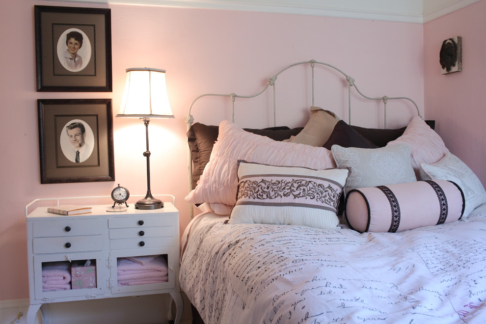 Mid-sized elegant guest carpeted bedroom photo in Portland with pink walls