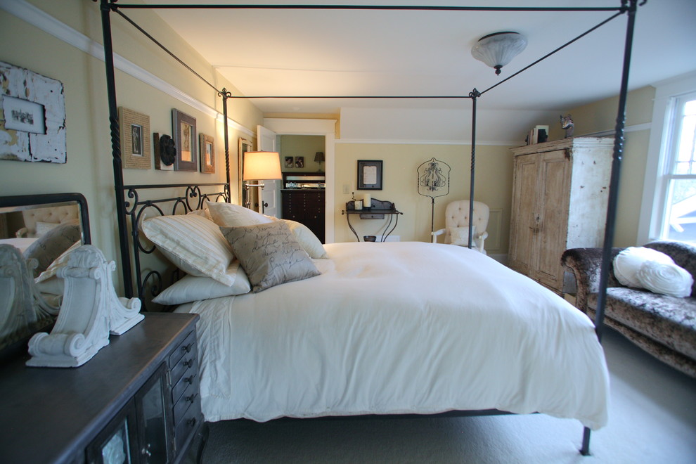 Inspiration for a large timeless master carpeted bedroom remodel in Portland with beige walls
