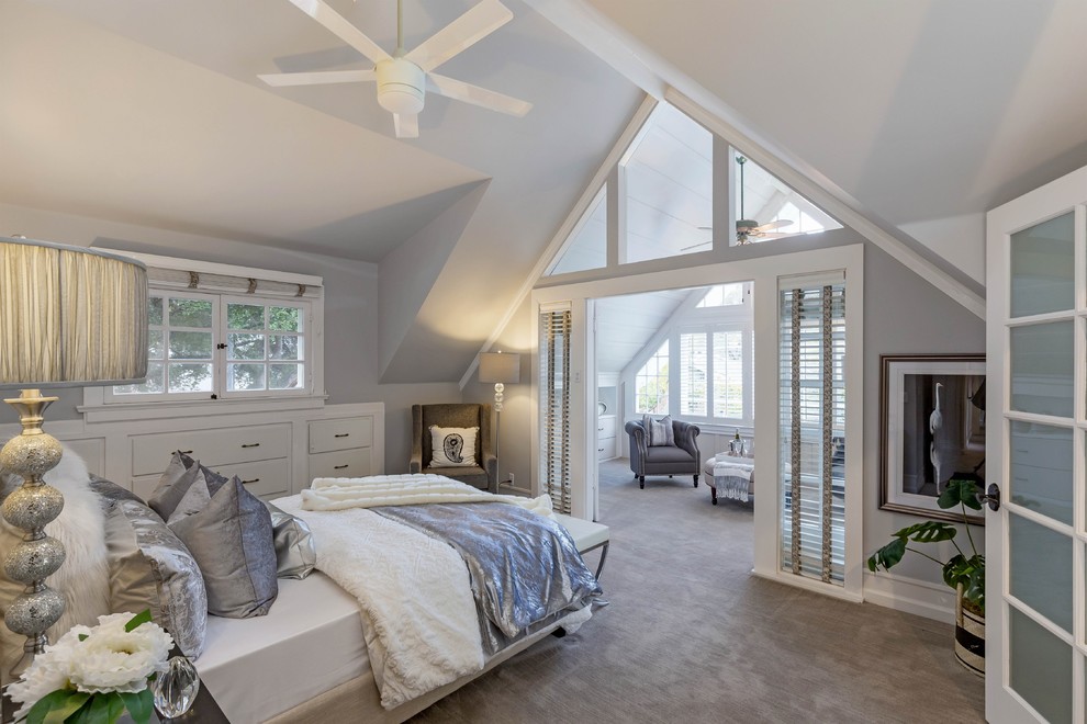 Example of a mid-sized transitional master carpeted and beige floor bedroom design in San Francisco with gray walls