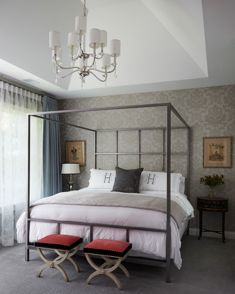 Photo of a traditional bedroom in Chicago with beige walls, carpet and grey floors.