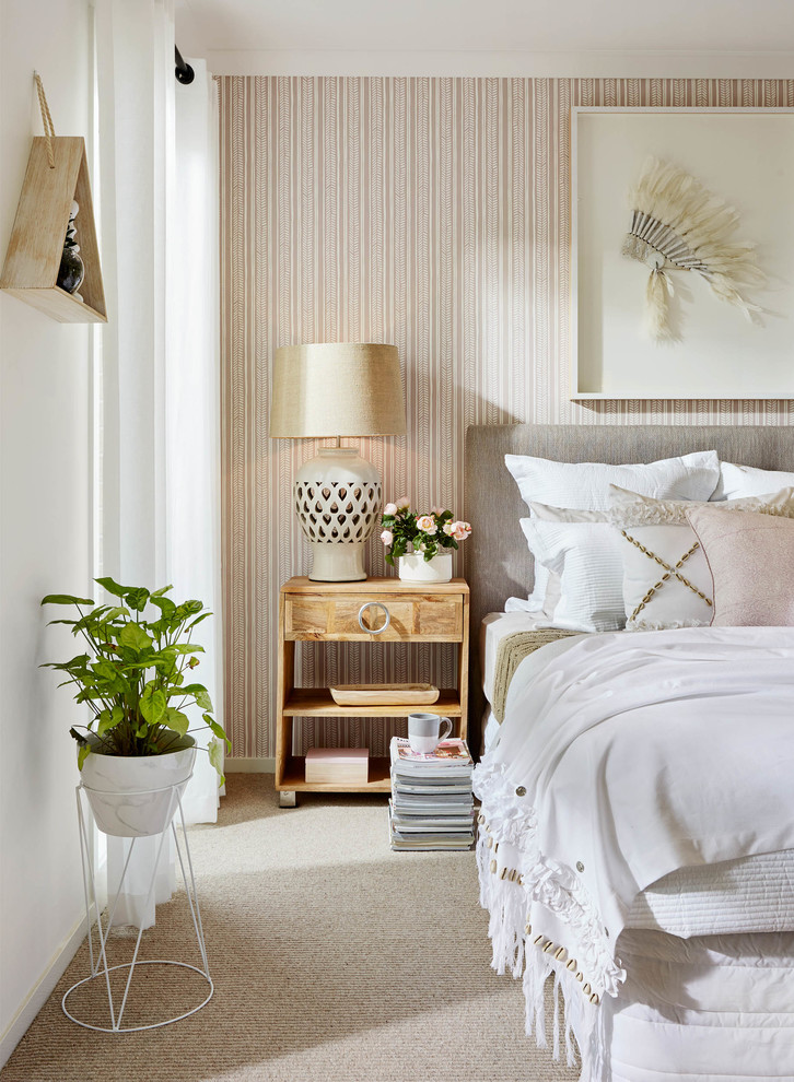 Inspiration for a classic grey and pink bedroom in Melbourne with beige walls and carpet.