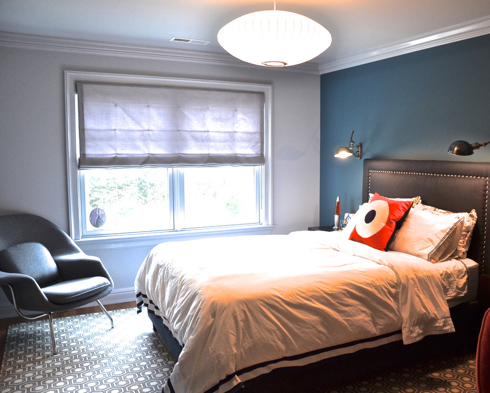 This is an example of a traditional bedroom in New York with a feature wall.