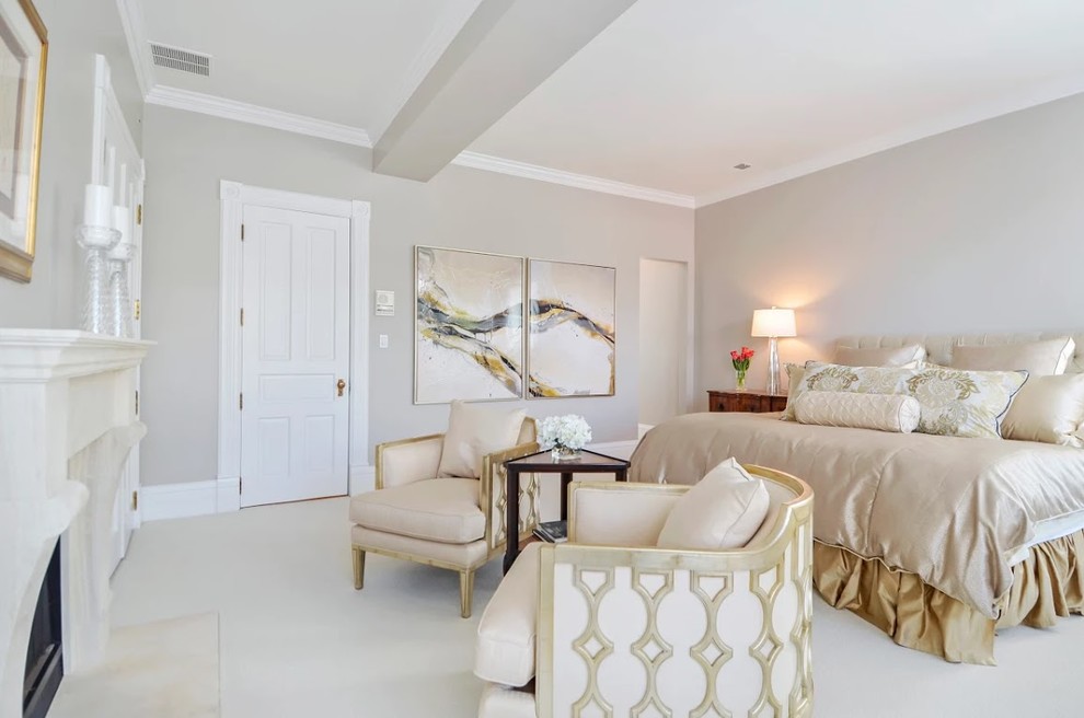 Inspiration for a large timeless master carpeted and beige floor bedroom remodel in Chicago with gray walls, a standard fireplace and a plaster fireplace