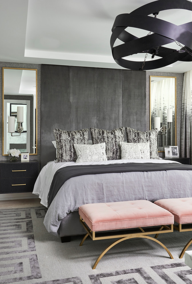 Example of a transitional bedroom design in Toronto with gray walls