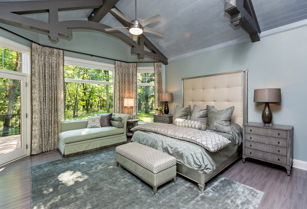 Example of a transitional bedroom design in Other with gray walls