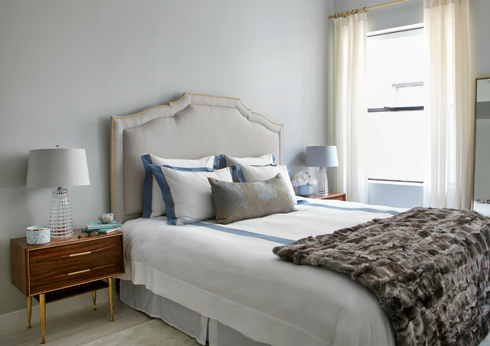 Inspiration for a transitional bedroom remodel in New York with gray walls