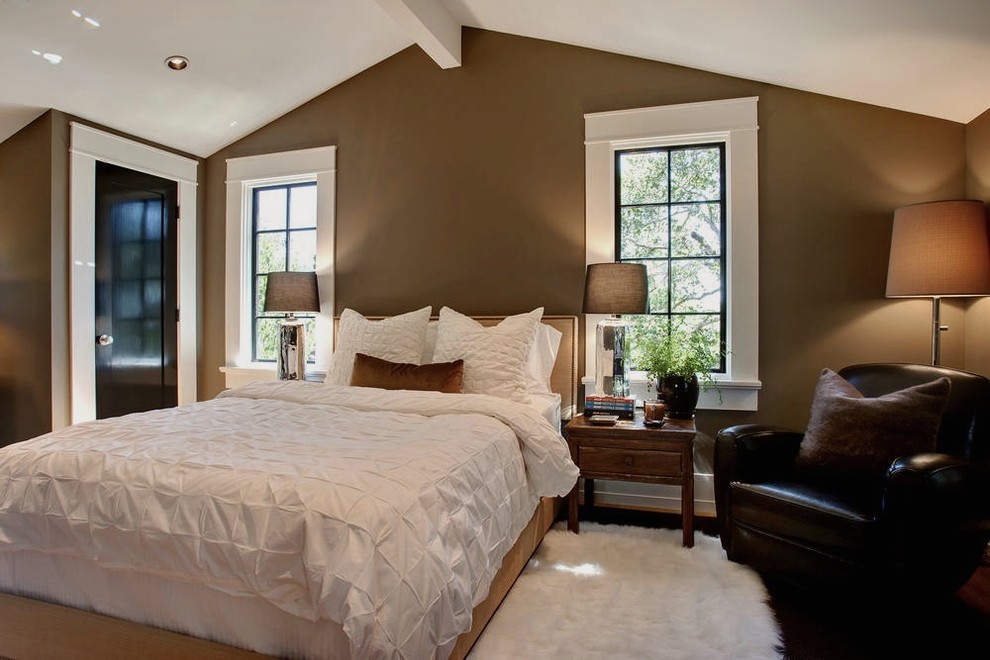 Example of a transitional bedroom design in San Francisco with brown walls