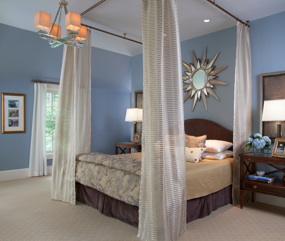 Design ideas for an expansive classic master bedroom in DC Metro with blue walls, carpet and no fireplace.