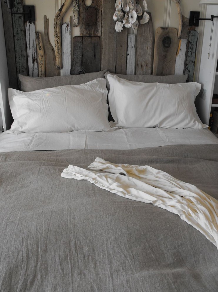 Inspiration for a coastal grey and cream bedroom in San Francisco with beige walls.