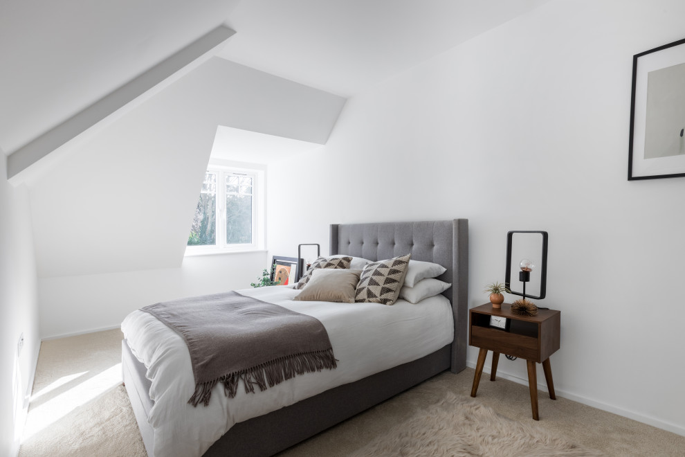 This is an example of a scandinavian bedroom in Sussex.