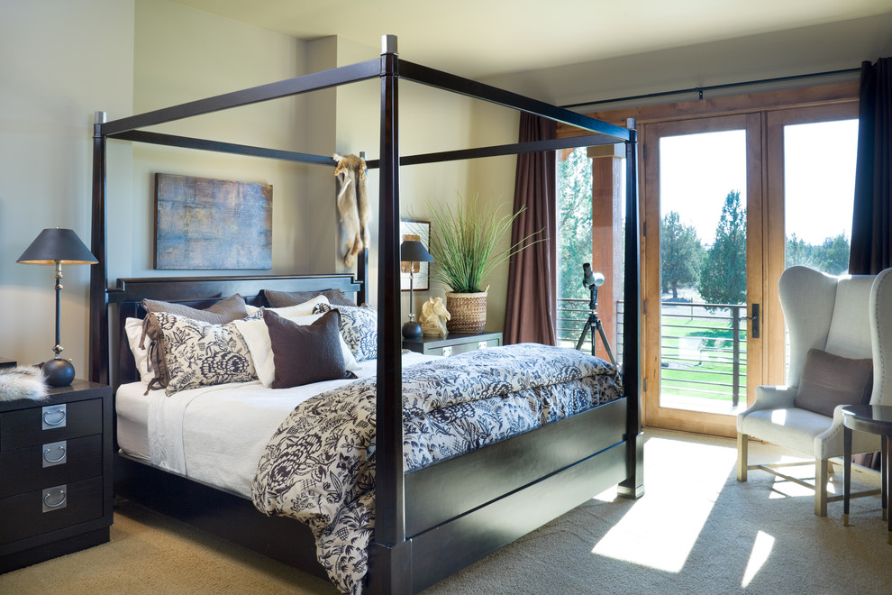 Example of a mountain style carpeted bedroom design in Portland with beige walls and no fireplace