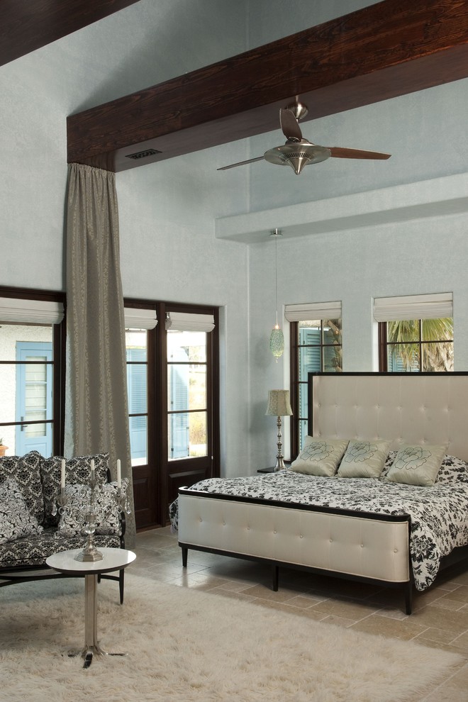 Design ideas for a mediterranean bedroom in Other with grey walls.