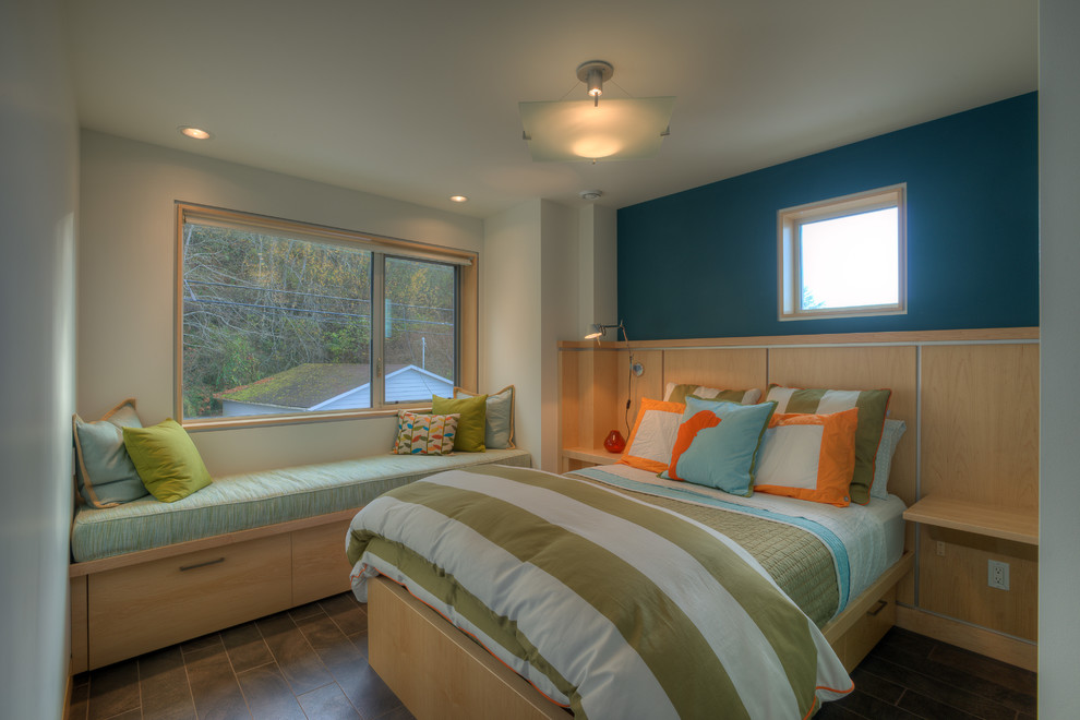 Coastal guest bedroom in Seattle with blue walls.