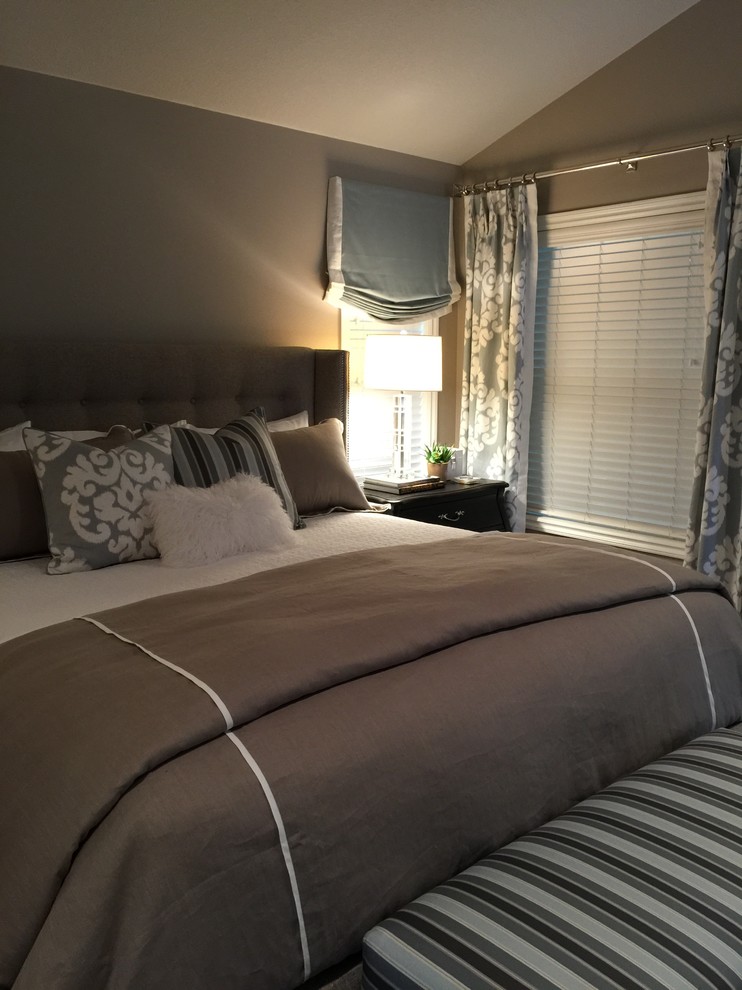 Medium sized classic master bedroom in Portland with beige walls and dark hardwood flooring.