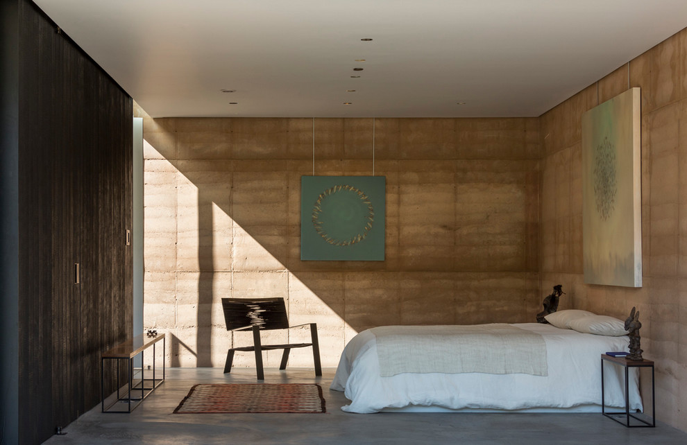 Idéer för ett mellanstort modernt sovrum, med betonggolv
