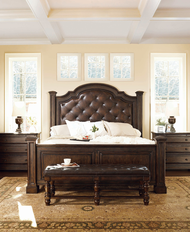 Inspiration for a timeless master dark wood floor bedroom remodel in Houston with beige walls and no fireplace