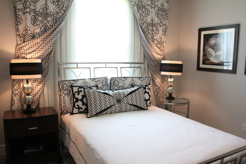Ejemplo de habitación de invitados contemporánea de tamaño medio con paredes grises