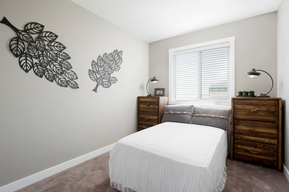 Design ideas for a medium sized classic guest bedroom in Calgary with beige walls and carpet.