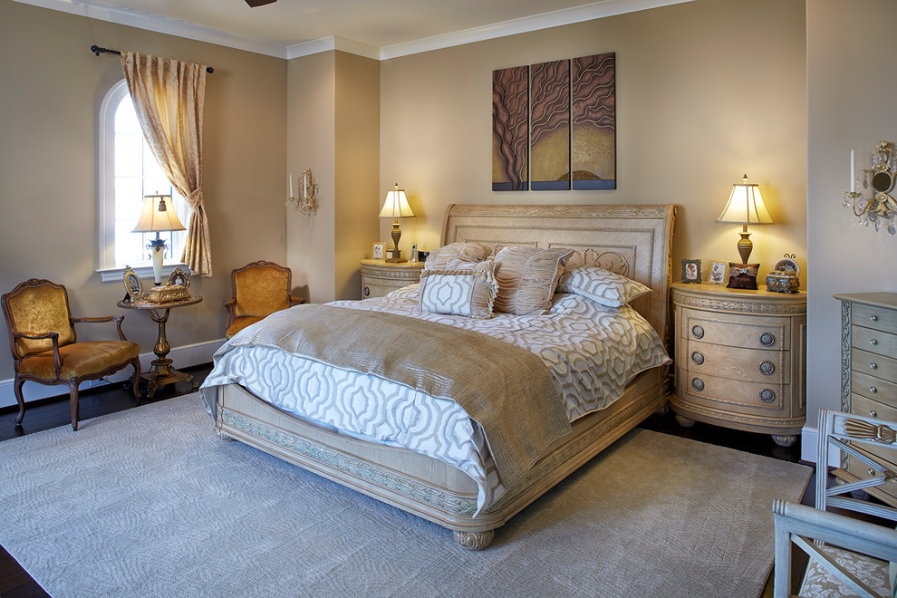 Photo of a medium sized traditional master bedroom in Other with beige walls, dark hardwood flooring and beige floors.