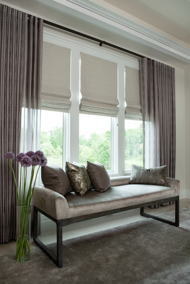 Example of a transitional bedroom design in Detroit
