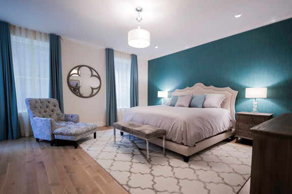 Transitional master bedroom photo in New York with beige walls