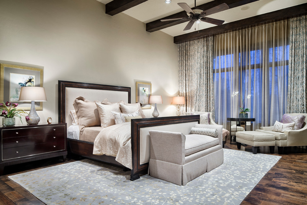 Example of a tuscan master bedroom design in Houston