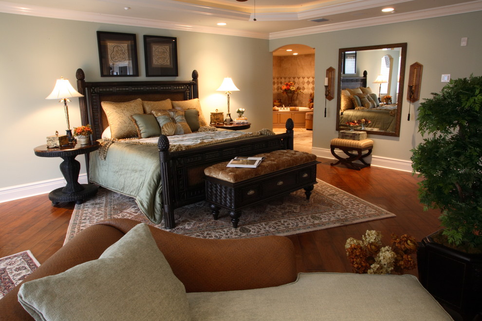 Bedroom - large traditional master dark wood floor bedroom idea in Tampa with green walls and no fireplace