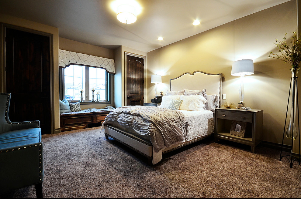 Example of a transitional bedroom design in Denver