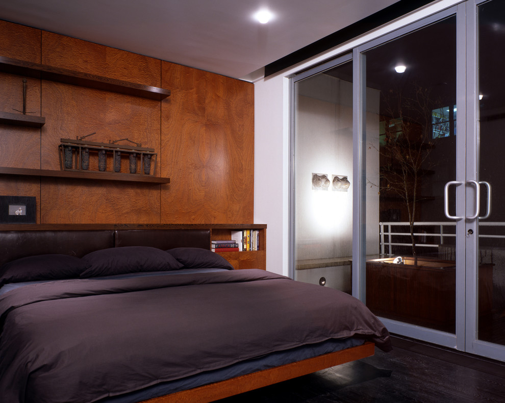 Bedroom - mid-sized craftsman master dark wood floor bedroom idea in New York with brown walls